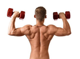 Young bodybuilder with dumbbells on white background .