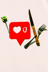 knife, fork and pepper on contemporary social network system, food concept theme