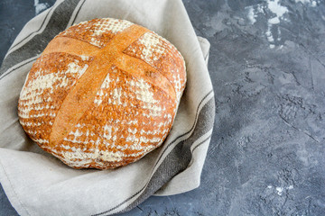Homemade bread on a black background.