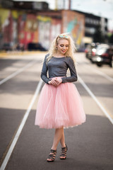 Very pretty girl walking down the street