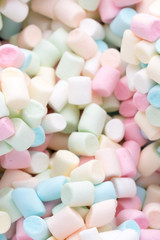 Background or texture of colorful mini marshmallows.
