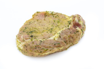 Pork chop, marinated. Isolated on the white background.