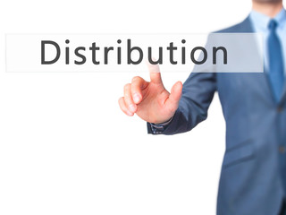 Distribution - Businessman hand pushing button on touch screen