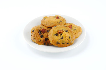Homemade chocolate chip and almond cookies isolated on white background