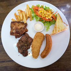 Pork and sausage steak