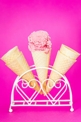 Strawberry on Raspberry Ice Cream Cone on Pink Background, Minimal concept, Vertical View
