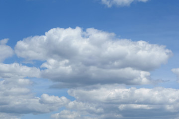 Naklejka na ściany i meble Cloud against the blue sky in Omsk