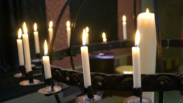 Candles flaming in candlestick