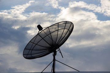 Satellite on the sky background.