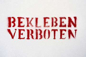 Germany, German sign with red capitals on white background: Fly-Posters prohibited - will be...
