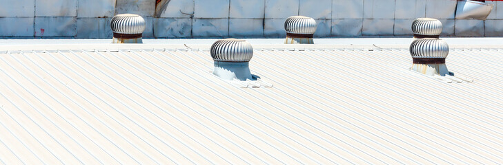 Architectural detail of metal roofing on commercial construction © patboon