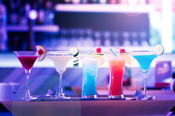 Row of cocktail drink on table