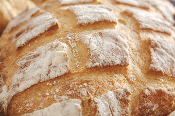 Bread texture background, closeup of baguette loaf
