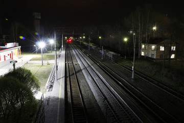 Fototapeta na wymiar Railway and light lanterns in a summer
