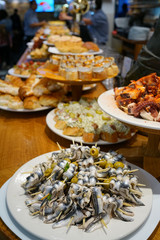 Spanish fingerfood and tapas set on bar counter