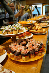 Spanish fingerfood and tapas set on bar counter