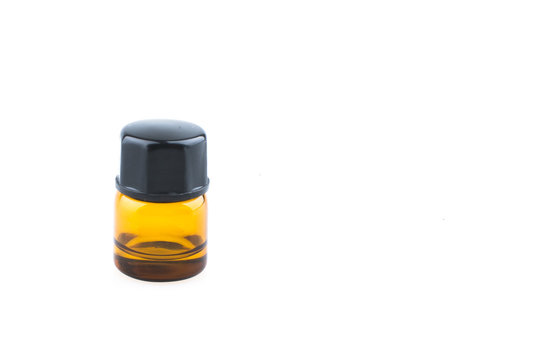 1ml essential oil bottles isolated on white background close up