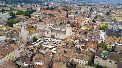 Naklejka premium Aerial video shooting with drone on Trento, famous Trentino city near the Adige river in northern Italy