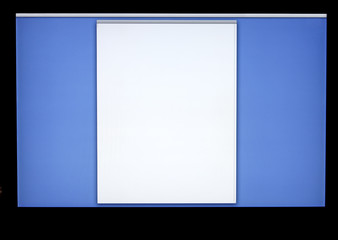 Blue computer monitor screen with blank workspace.