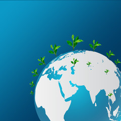 Naklejka premium Blue planet and green tree on blue background. Happy Earth Day. Save the Earth concept. go green. ecology concept