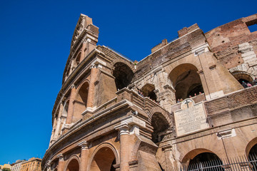 View of Colosseum in Rome and morning sun, Italy, Europe.