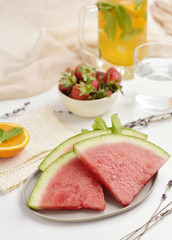 watermelon, strawberries and cold tea