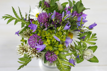 Bouquet of summer fresh flowers on white background