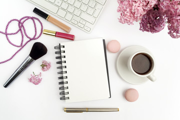 lilac flowers on workdesk female home office with keyboard and coffee white background top view mockup