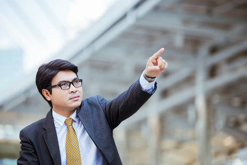 business man pointing at something interesting