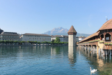 Fototapeta na wymiar Historic city center of Lucerne with famous Chapel Bridge