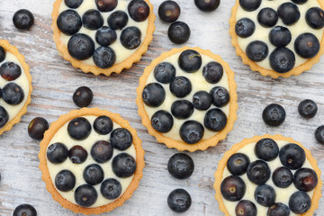 blueberry fruit cake on wood