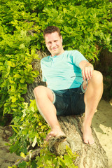 Man spending free time outside, looking at nature