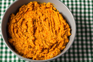 Bowl of carrot hummus