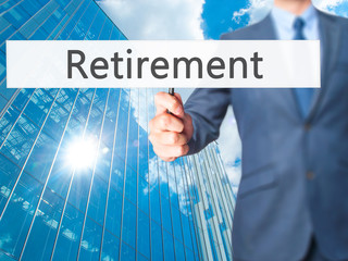 Retirement - Businessman hand holding sign