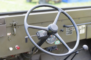 Fototapeta na wymiar View into a cockpit of a military jeep