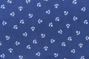 blue fabric with anchor repeating pattern © tapui