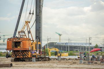 Fototapeta na wymiar Machine for piling. Construction machinery on the site for the construction of a