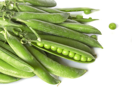 Pile of scattered young green peas