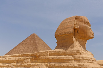Great Pyramid behind Great Sphinx in Giza, Egypt