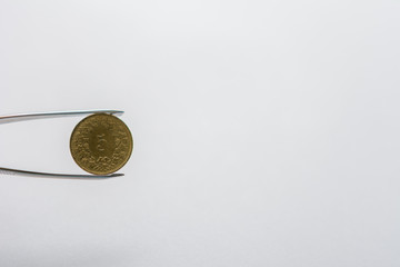 Münze in Gold - 5 Rappen stück schweizer Franken 