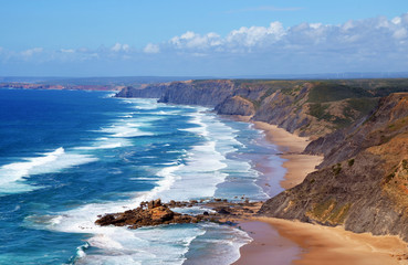 Beautiful waves at West Coast of Algarve between Praia do Amado and Cabo de Sao Vincente (Costa...