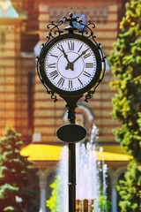 Fototapeta na wymiar Street Clock in Timisoara