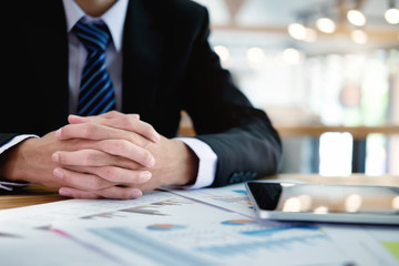 Business man working at office with laptop and documents on his desk, consultant lawyer concept