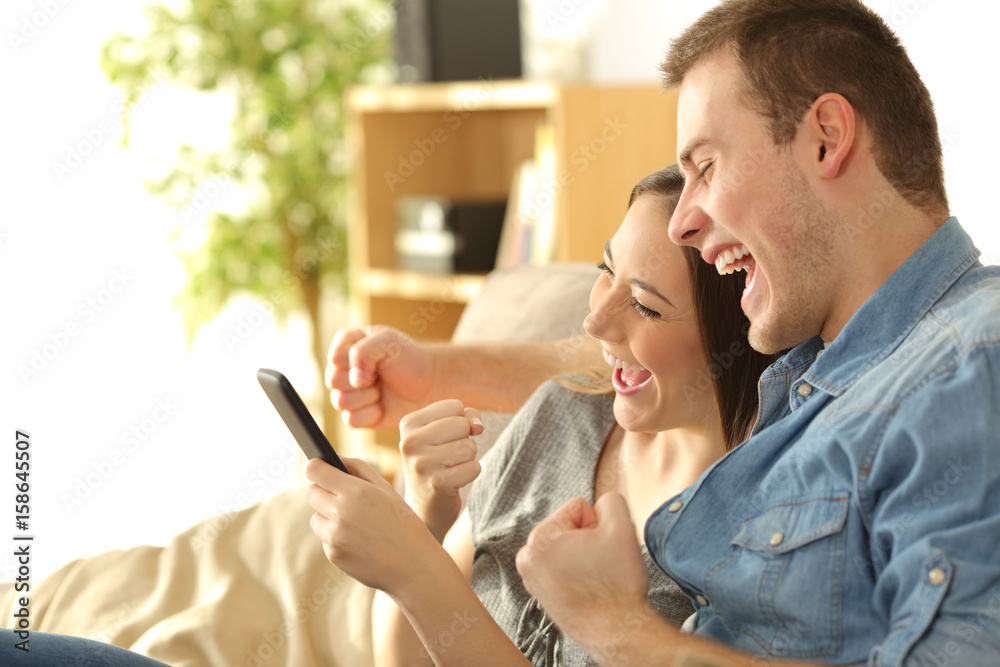 Sticker excited couple checking content in a phone