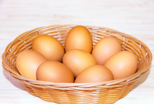 Eggs in a wicker basket on a table