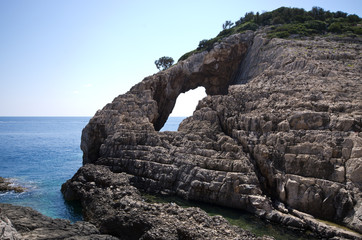 Korakonissi bay with stone bridge formation, Zakynthos, Greece