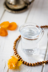 Naklejka premium Glass of Ramadan water for iftar time.
