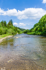 Background of Carpathian mountain river with long exposure