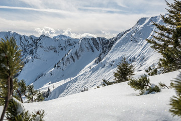 Fototapeta na wymiar Snowy mountainous Alpine landscape
