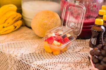 QUITO, ECUADOR- 07 MAY, 2017: Close up of a healthy fruit salad inside a white plastic tray